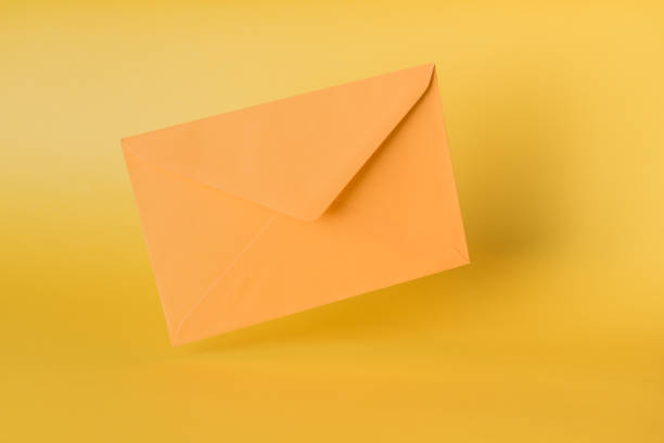 istock Background of yellow envelopes. Conceptual envelopes. 1750458575