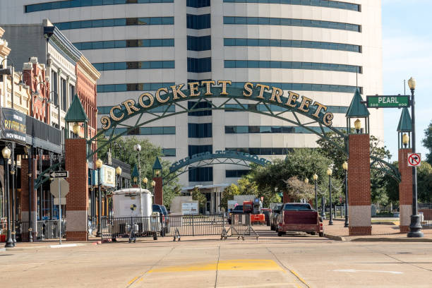 Historic Crockett Street in Beaumont Texas. Beaumont, Texas USA - October 21, 2023:  Historic Crockett Street Dining and Entertainment Complex located in Downtown Beaumont, Texas. Consisting  of  buildings undergoing restoration that were originally built at the turn of the 20th century. beaumont tx stock pictures, royalty-free photos & images
