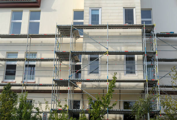 istock A white house with a scaffold outside, building site 1750498257