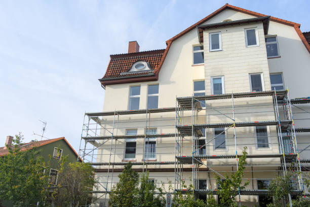 istock A white house with a scaffold outside, building site 1750498270