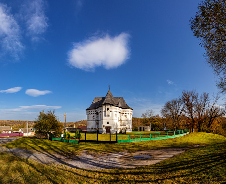 Defense church - fortress on an autumn day in the village of Sutkivtsi