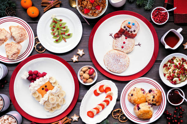Christmas breakfast table scene on a rustic dark wood background