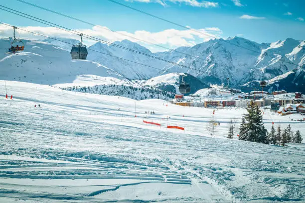 Photo of Ski tracks in the fresh snow on the slope, France