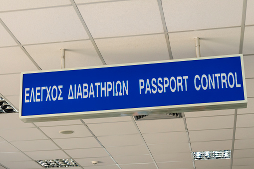 Bilingual sign in a Greek airport for Passport Control