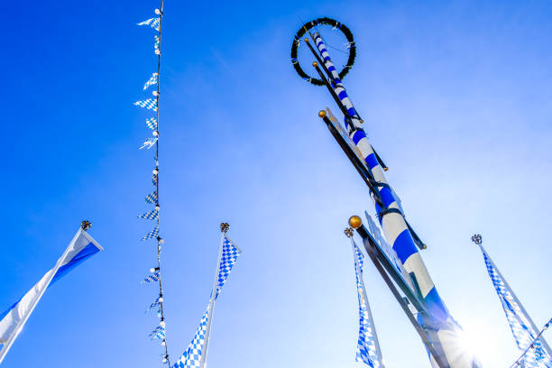 istock typical bavarian maypole in front of blue sky 1750644822