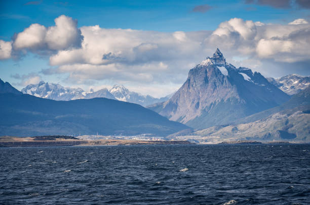 View on Ushuaia city from the boat navigating on Beagle channel, Argentina, Patagonia, South America View on Ushuaia city from the boat navigating on Beagle channel, Argentina, Patagonia, South America beagle channel stock pictures, royalty-free photos & images
