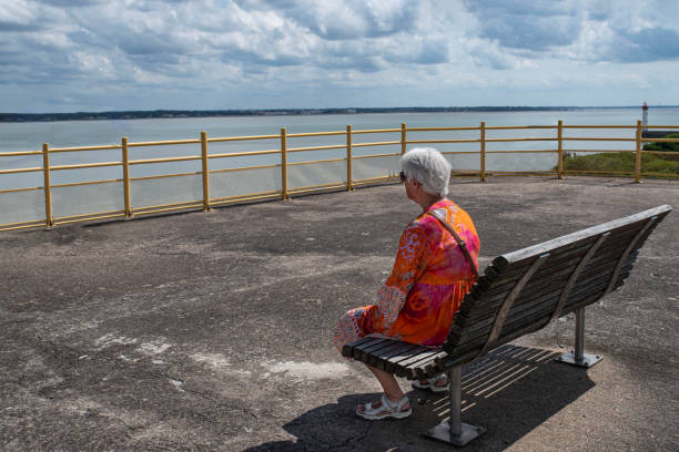 istock Senior citizen looking out to sea 1750674053