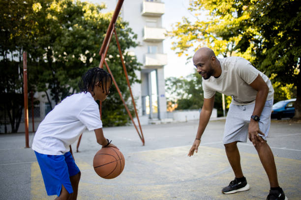 istock Latin American boy and his dad playing basket 1750758732