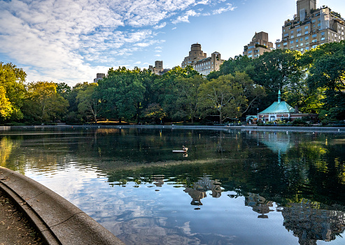 New York, NY - US - Oct 11, 2023 Landscape view of Kerbs Memorial Boathouse on Conservatory Water, a pond located in a natural hollow within Central Park in Manhattan, New York City.
