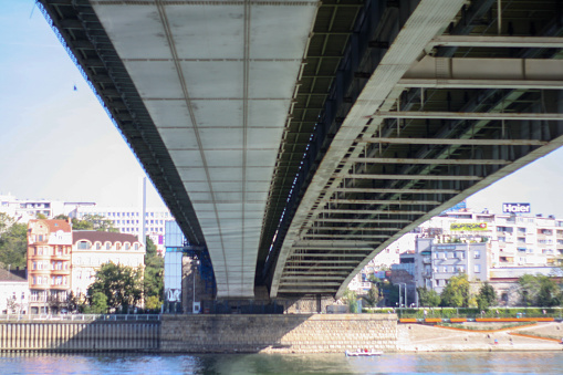 view of the river under the old bridge