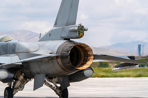 The exhaust of the fighter jet. Jet plane nozzle