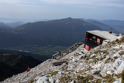 Mount Krn ,Kobarid, Slovenia- October 10, 2023: The Mountain Hut of Gomiščkovo Zavetišče on the top of Mount Krn in Julian Alps.