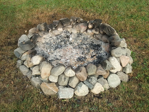 Circular fire pit made from large rocks