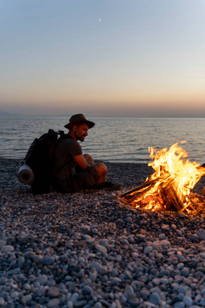 istock Young people camping by the sea. 1750808058