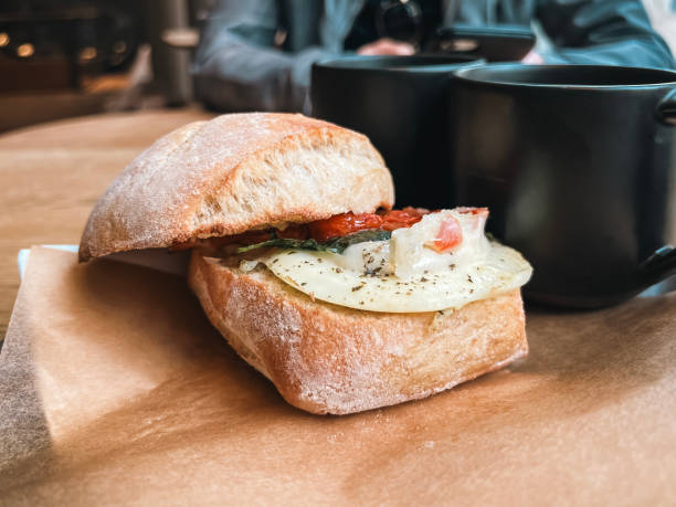 istock Delicious Breakfast Sandwich and Coffee with a Friend 1750880102
