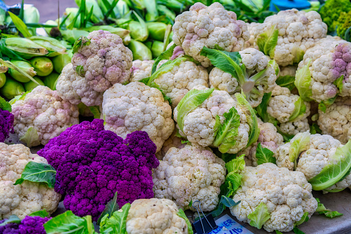 farmer's market purple and white cauliflower