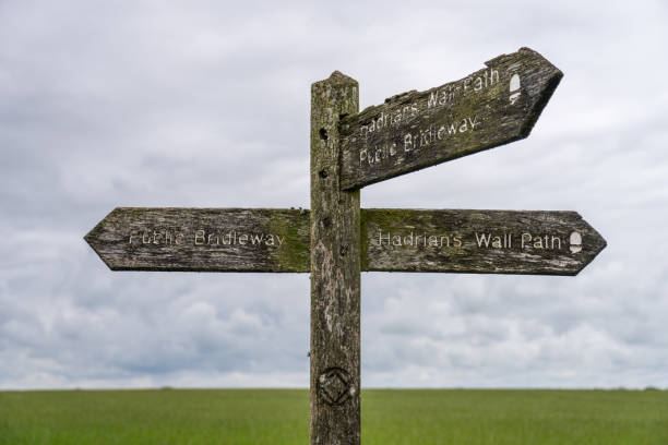 istock an old wooden sign post for Hadrian's Wall Path in Cumbria, UK 1750920417
