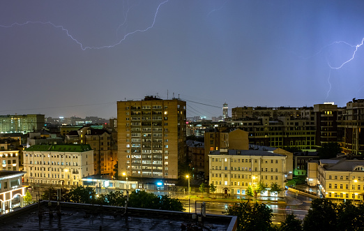 July 10, 2022, Moscow, Russia.  Lightning in the night sky during a thunderstorm in the center of the Russian capital.