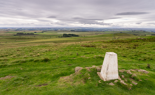 Panoramic view from Tempelwand sandstone viewpoint with wooden cross on hill Topfer, Oybin with view of Zittau and Poland German borders in Zittauer Gebirge mountains, Saxony, germany. Summer sunny day.