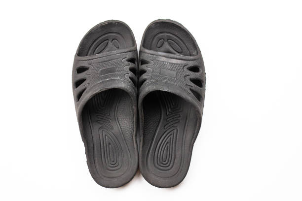 istock Rubber black slippers on a white background. Rubber slippers, black slippers. 1751038354