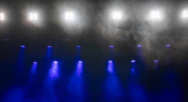 istock White and blue stage lights in the fog. 1751079585