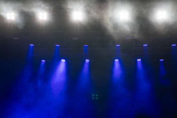istock White and blue stage lights in the fog. 1751083735