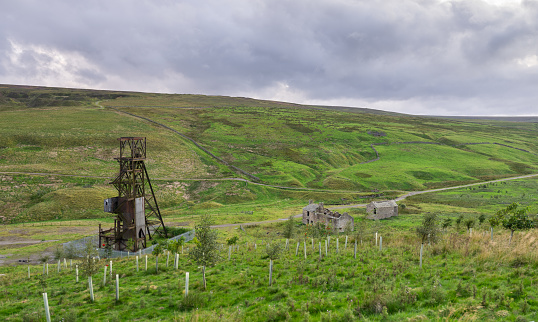 looking out over an abandoned mine (Groverake Mine) in the North Pennines Area of Outstanding Natural Beauty (ANOB), near Allenheads, Durham, UK