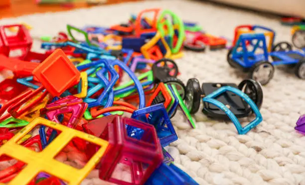 Vibrant, diverse kids' toys like Legos and building blocks spark creativity and learning in children, offering endless play possibilities for imaginative development
