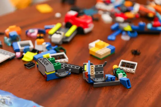 Vibrant, diverse kids' toys like Legos and building blocks spark creativity and learning in children, offering endless play possibilities for imaginative development