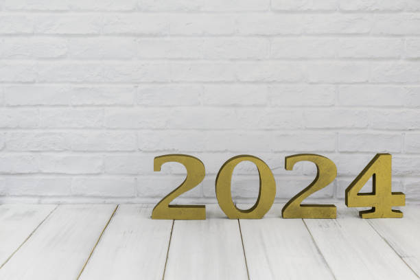 istock 2024 new year on white wood table over white background with copy space 1751123008