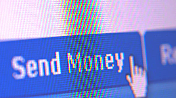 istock send money written on computer monitor 175113139