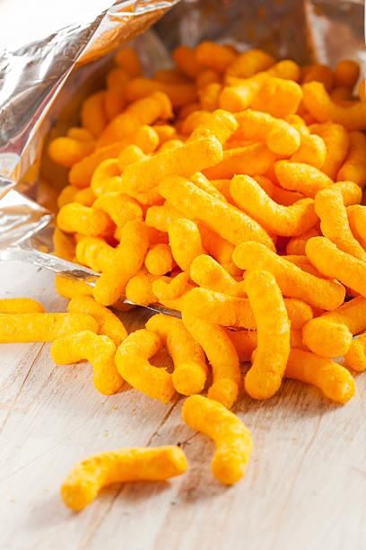 istock Unhealthy Orange Puffy Cheese Crisps 175113419