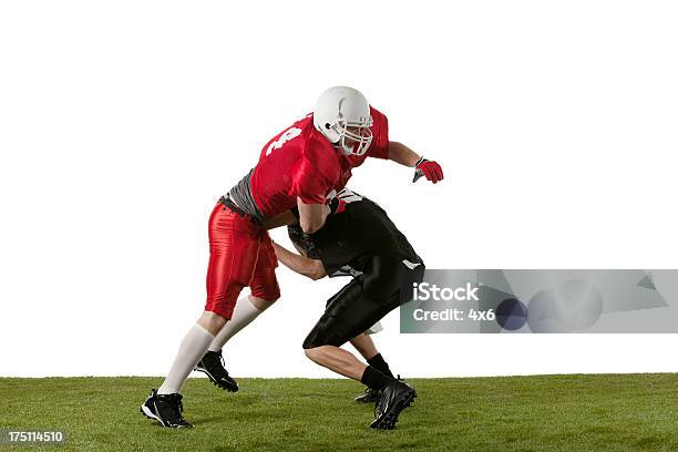 Football Players In Action Stock Photo - Download Image Now - 20-29 Years, Activity, Adult