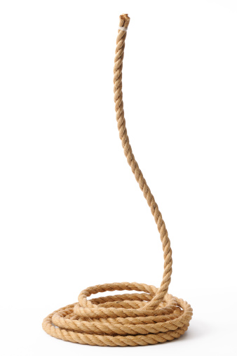 Brown rope moving up smoothly, isolated on white background with clipping path.