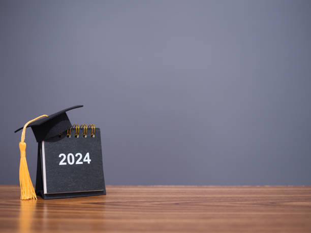 istock Study goals, 2024 Desk calendar with graduation hat. The concept for Resolution, Goal, Action, Planning, and manage time to success graduate. 1751159506
