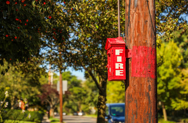 istock red, wall-mounted fire alarm with a glowing indicator, ready to alert in emergencies, symbolizing safety and preparedness 1751180364