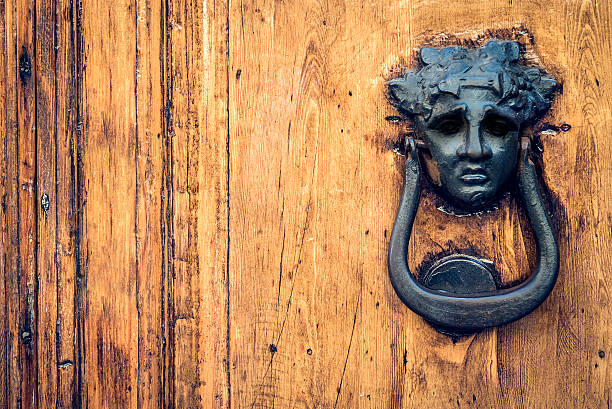 Wood Vintage Ornated Door with Iron Handle stock photo