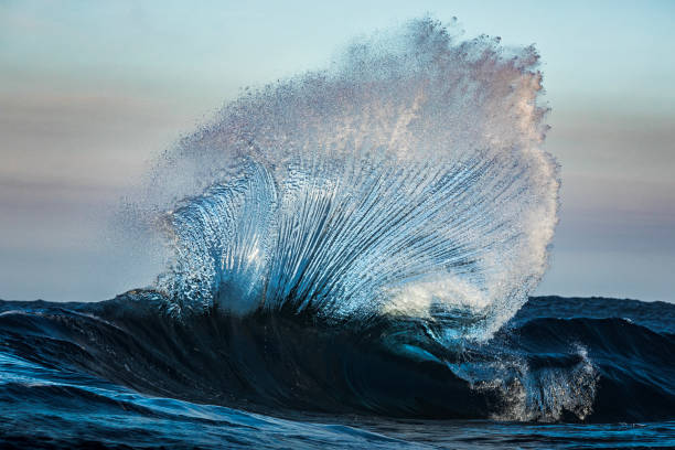 istock Ocean wave energy colliding forming an abstract fan of water texture 1751229571