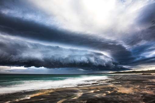 Stormy background of extreme weather system forming over the coastline on the South Coast of NSW, Australia.