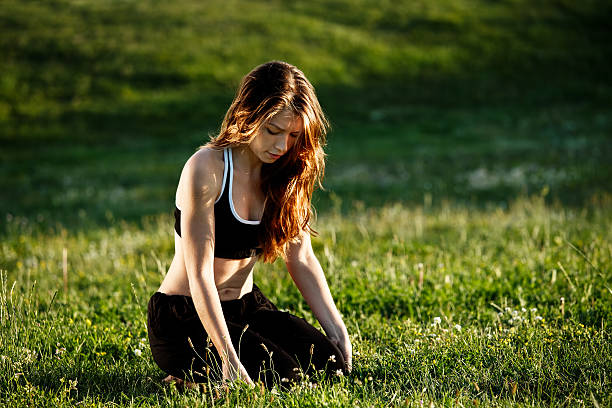 istock Young woman doing yoga asana 175123788