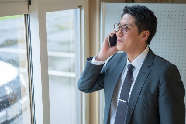 istock Working business man talking by phone 1751238323