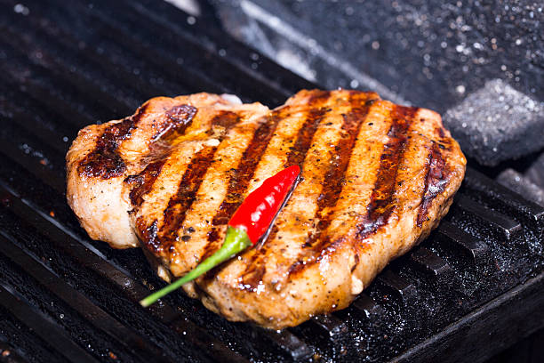 istock cooking a steak on the grill 175124952