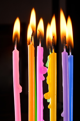 Burning colorful candles birthday candles