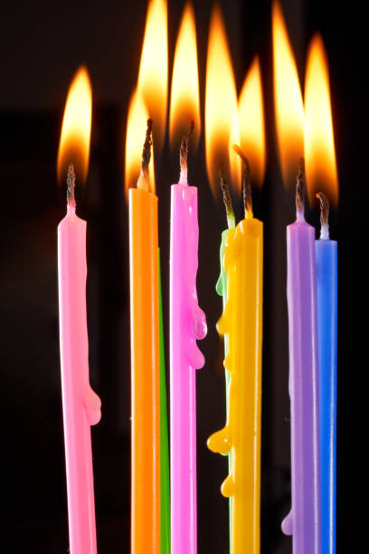istock Burning colorful candles birthday candles 1751252959
