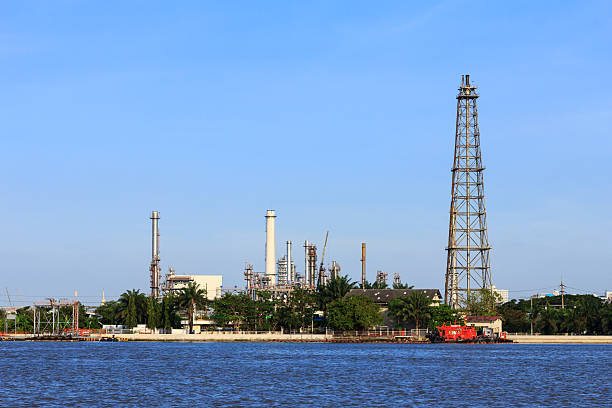 istock Oil refinery with chimney and blue sky 175127357