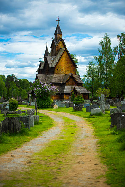 Way to Heddal Stave Church A vertikal shot of the small way to the stave church of Heddal. heddal stock pictures, royalty-free photos & images