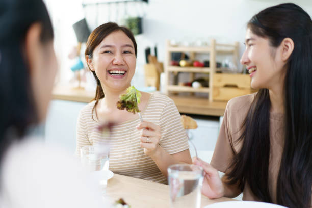 istock Asian young people have a meal together. 1751319217