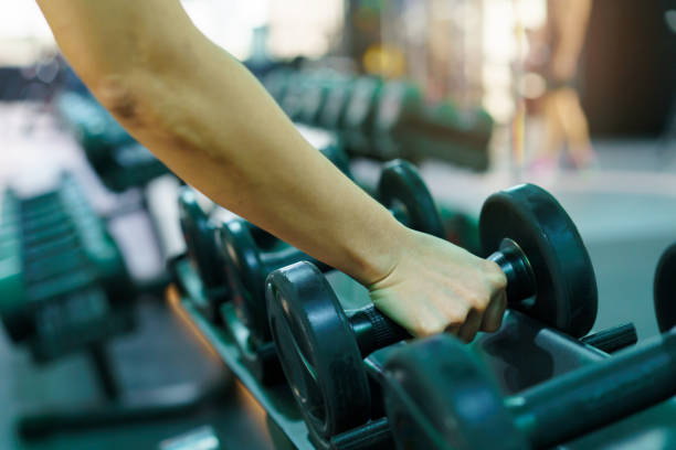 istock Woman exercise in gym. 1751319256