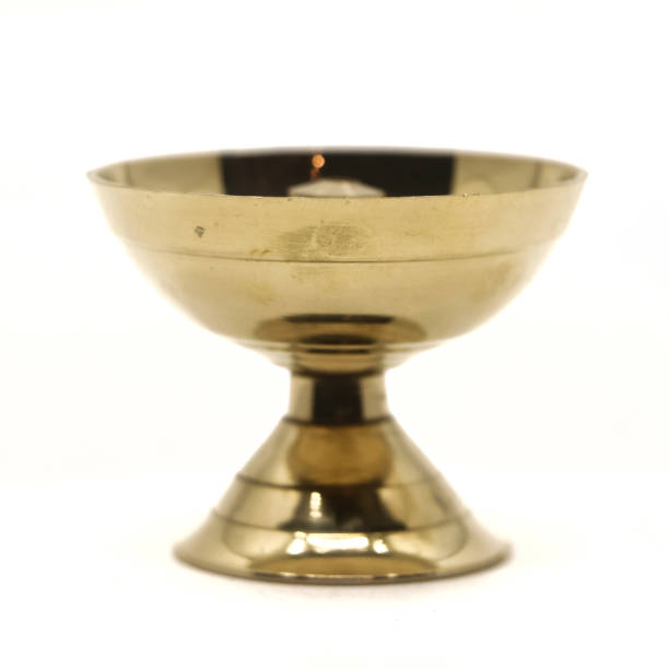 istock a symmetric golden oil diya lamp 1751355154
