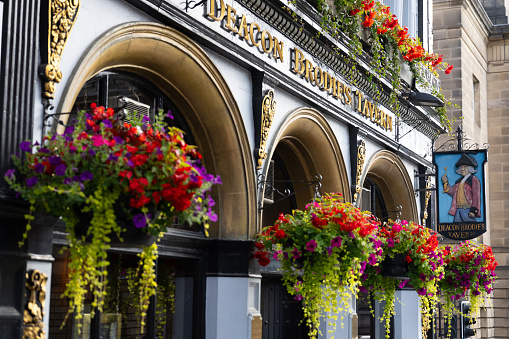 colourful pub (Deacon Brodie's Tavern) on the Royal Mile, Edinburgh, Scotland